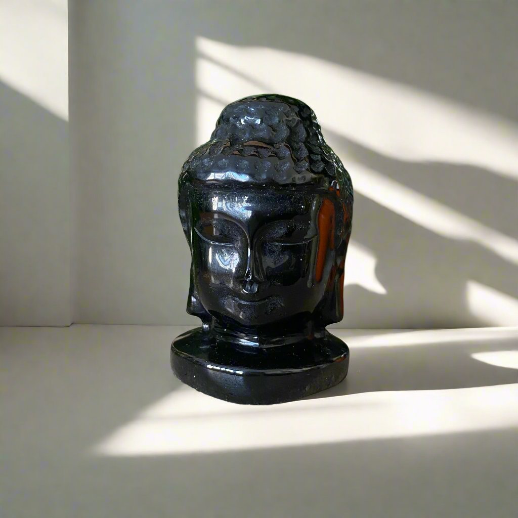 Carved Obsidian Buddha