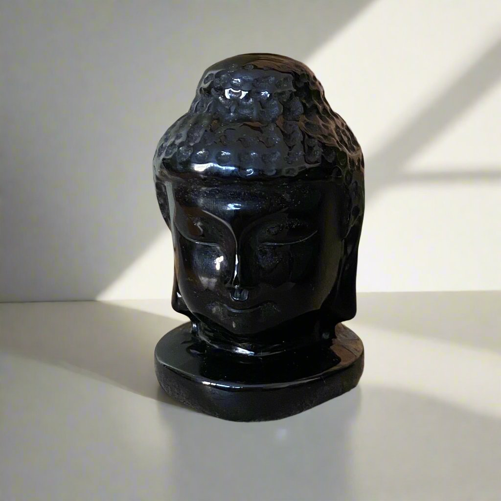 Carved Obsidian Buddha