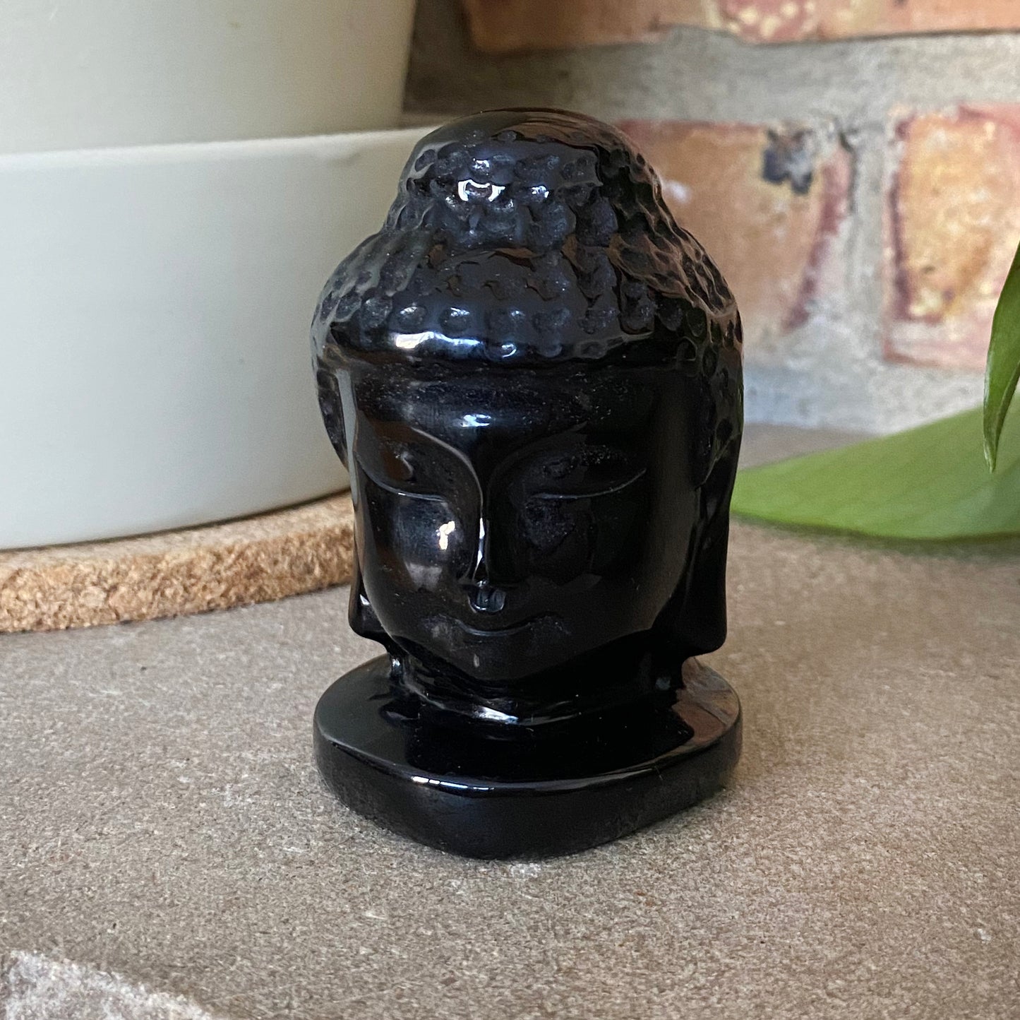 Carved Obsidian Buddha